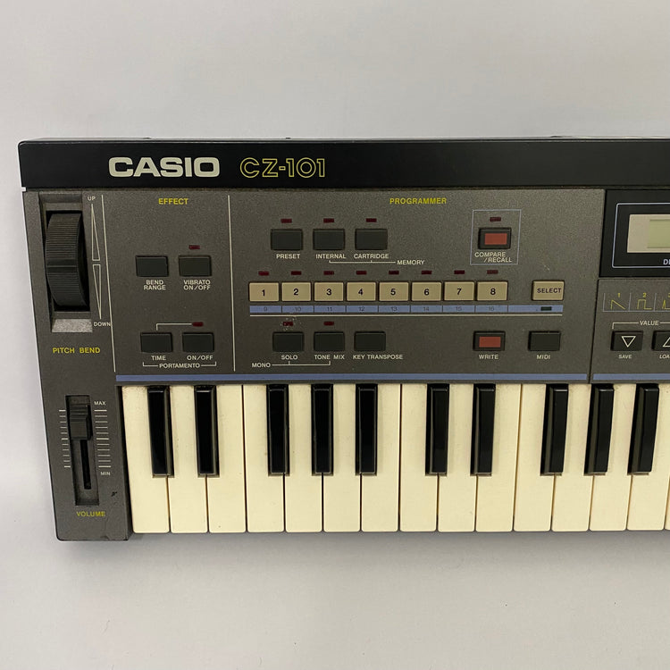 Casio CZ-101 with RA-3 RAM Cartridge and Patch Book