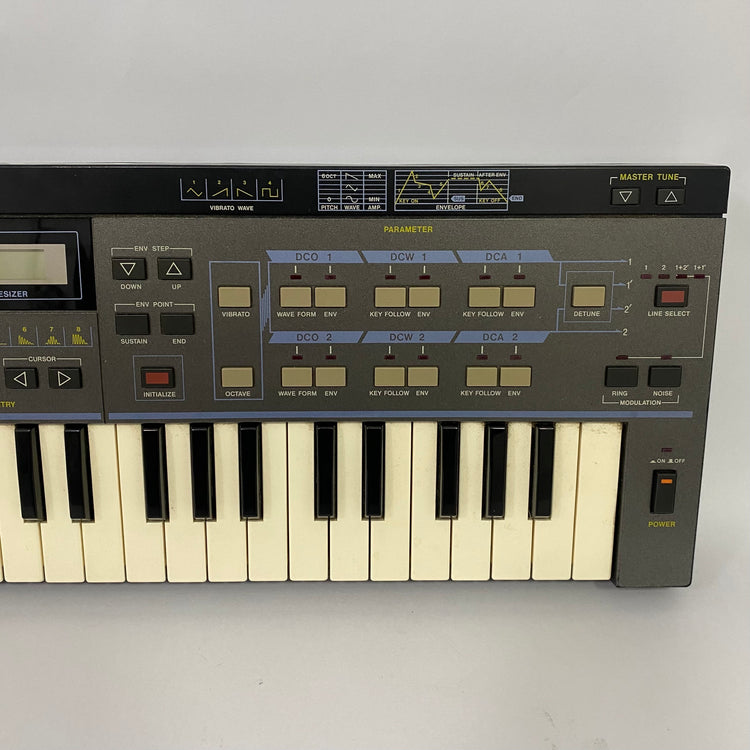 Casio CZ-101 with RA-3 RAM Cartridge and Patch Book