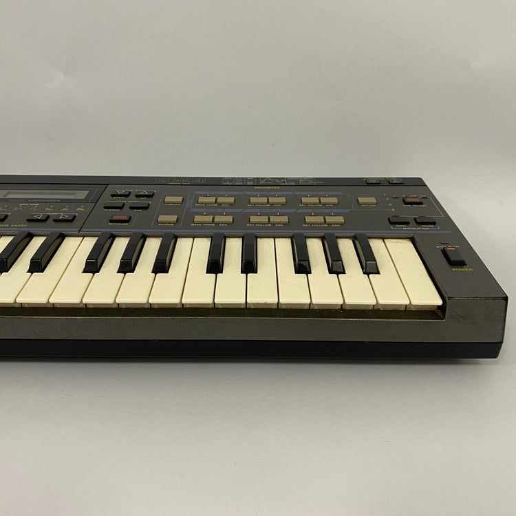 Casio CZ-101 with RA-3 RAM Cartridge and Patch Book