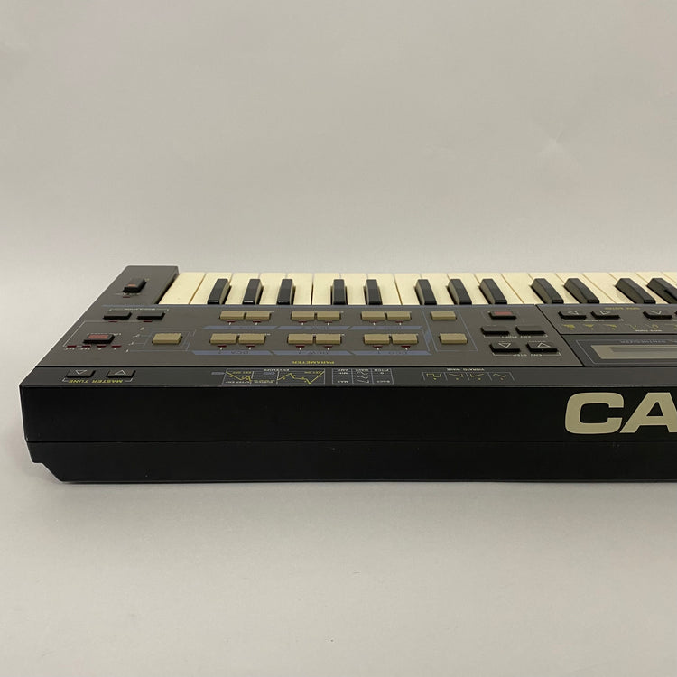 Casio CZ-101 with RA-3 RAM Cartridge and Patch Book