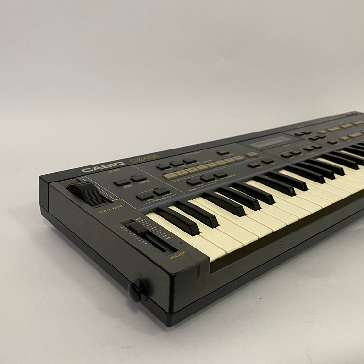 Casio CZ-101 with RA-3 RAM Cartridge and Patch Book