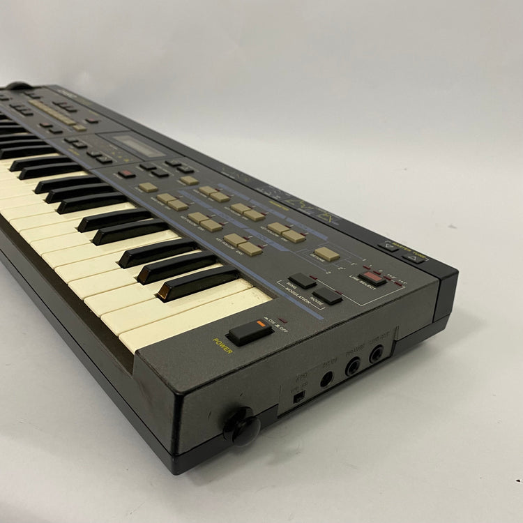 Casio CZ-101 with RA-3 RAM Cartridge and Patch Book